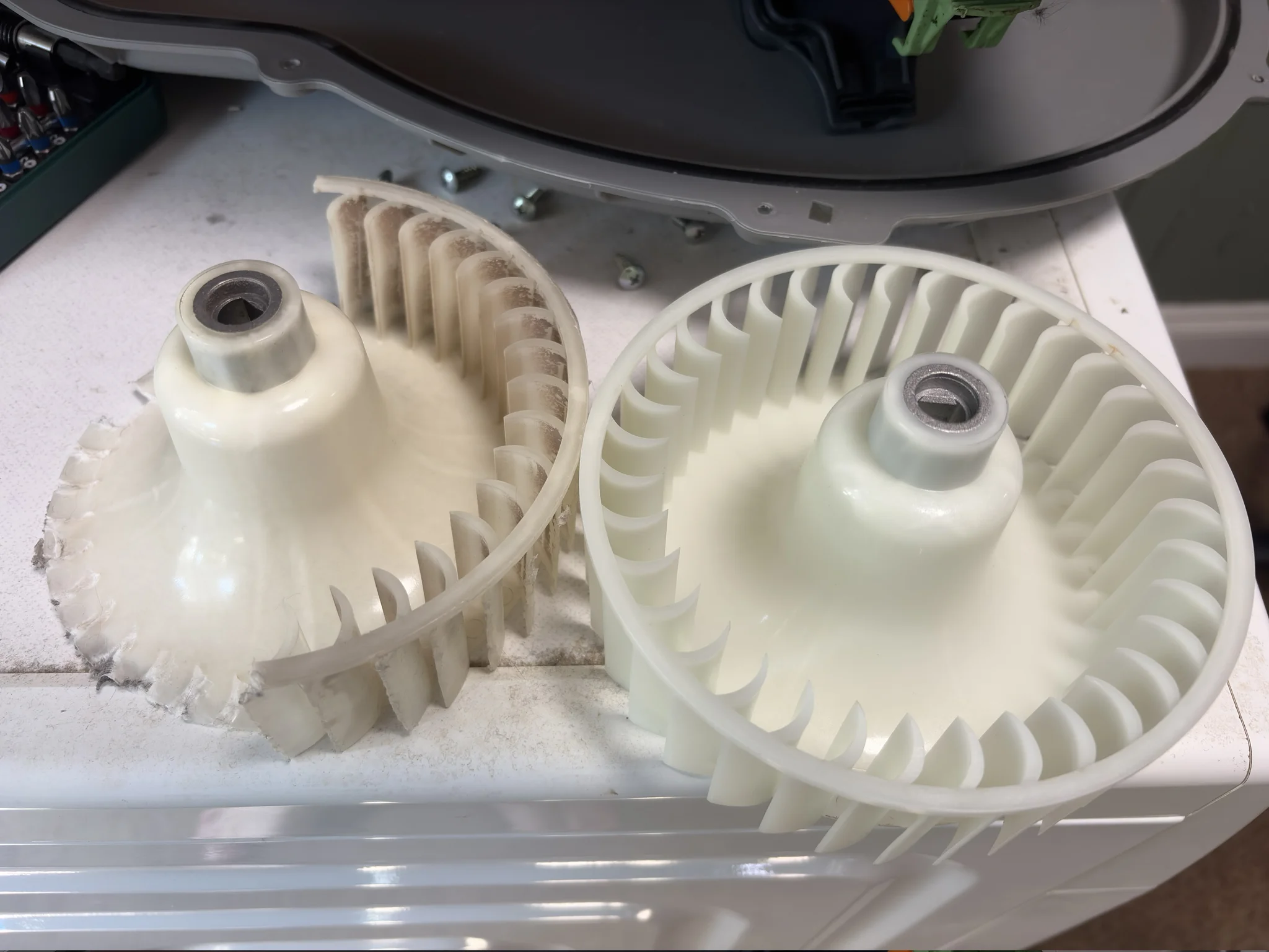 Can you tell which is which? A faded broken impeller next to a new impeller